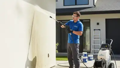 Brandon, FL pressure cleaning service removing algae and grime from an exterior by Brandon Paint Pros